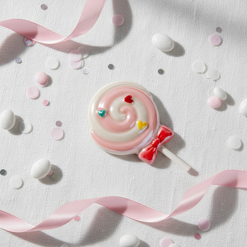 Decora il frigo con il magnete lecca-lecca Etm Lollipop in PVC rosa, ø 8 cm. Bomboniera battesimo bambina originale e colorata.