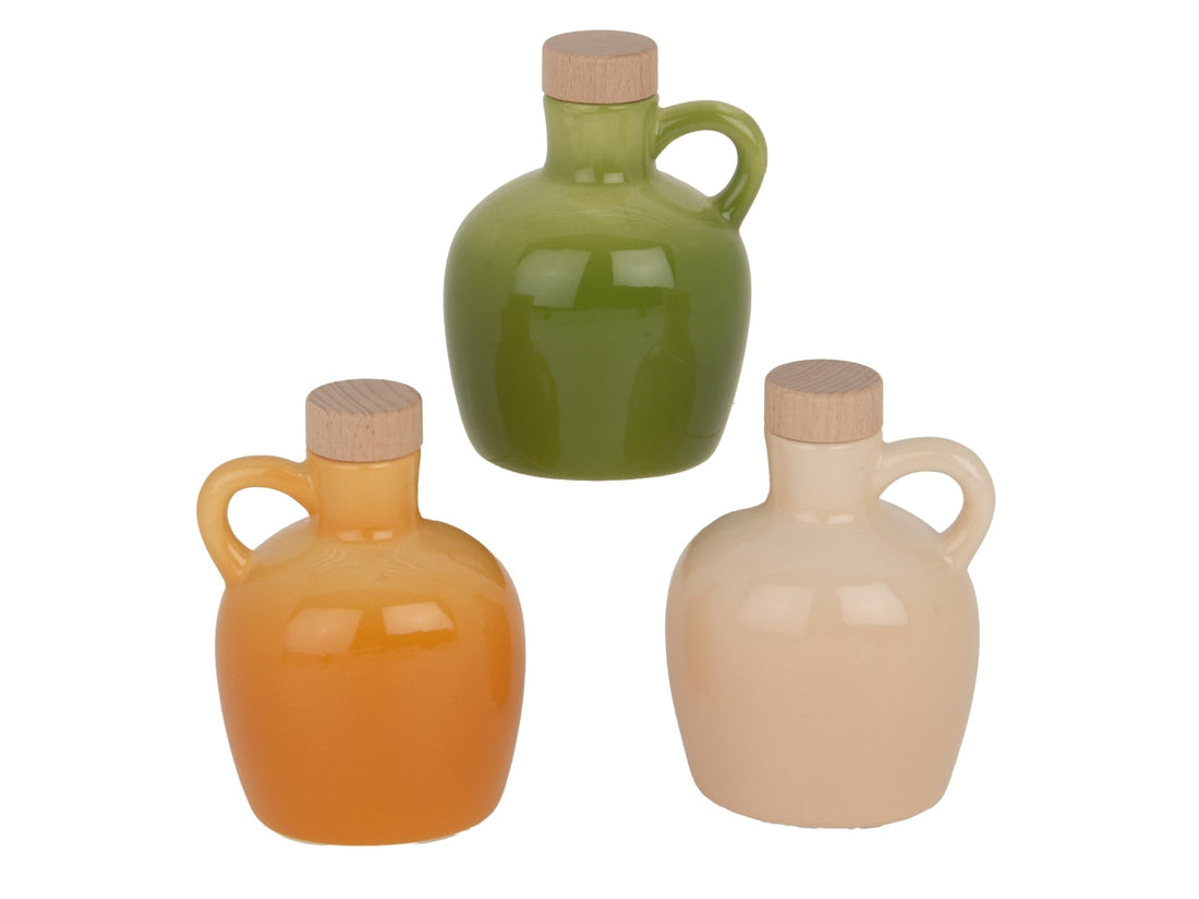 Dosa olio e aceto con l'oliera Etm Iride in vetro colorato, ø 8 cm H.11 cm, 3 colori assortiti. Accessorio tavola e regalo.