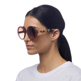 okkia okkia occhiale da sole premontato mod monica round traslucent pink clear havana ean 8055773198005
